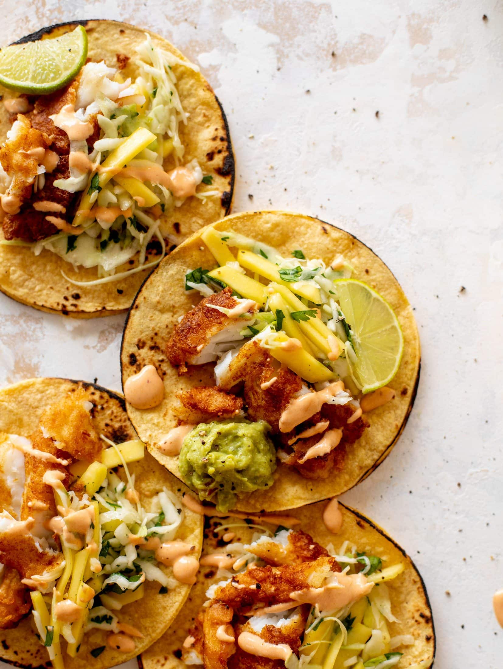 crispy fish tacos with mango slaw