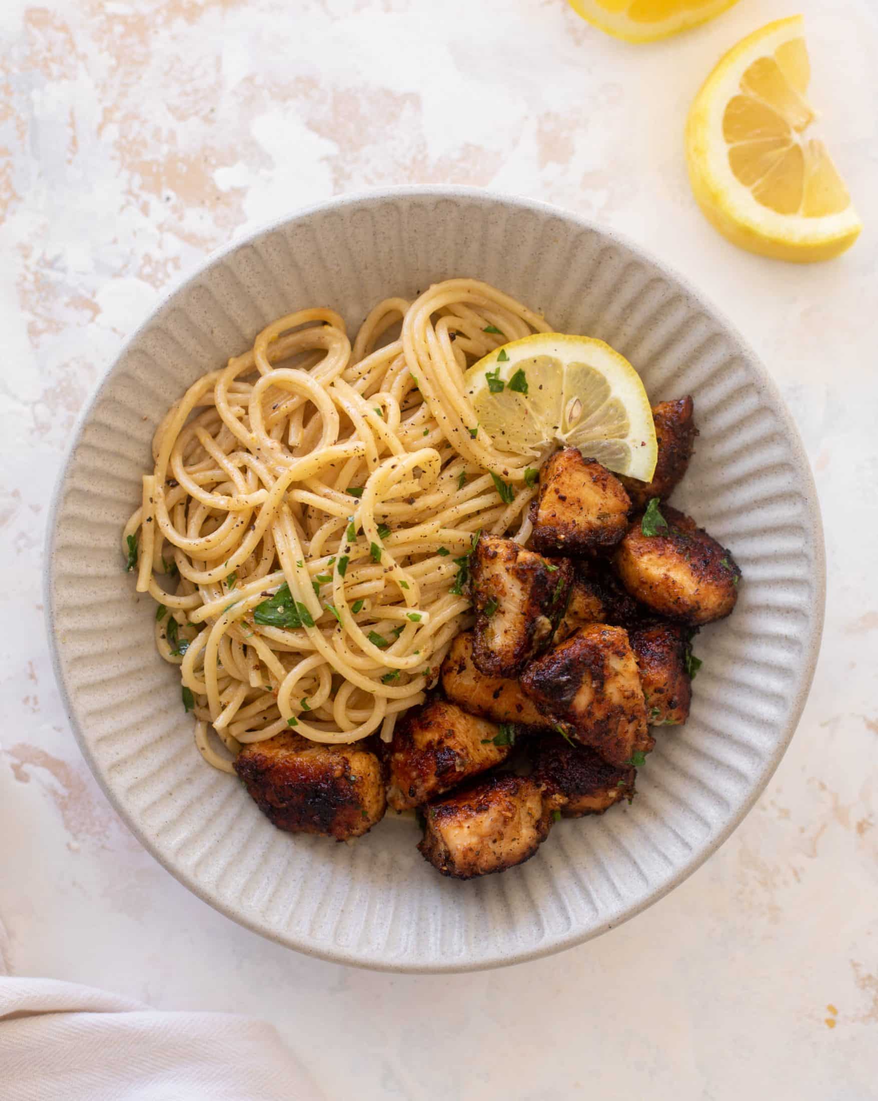 crispy lemon chicken bites and spaghetti