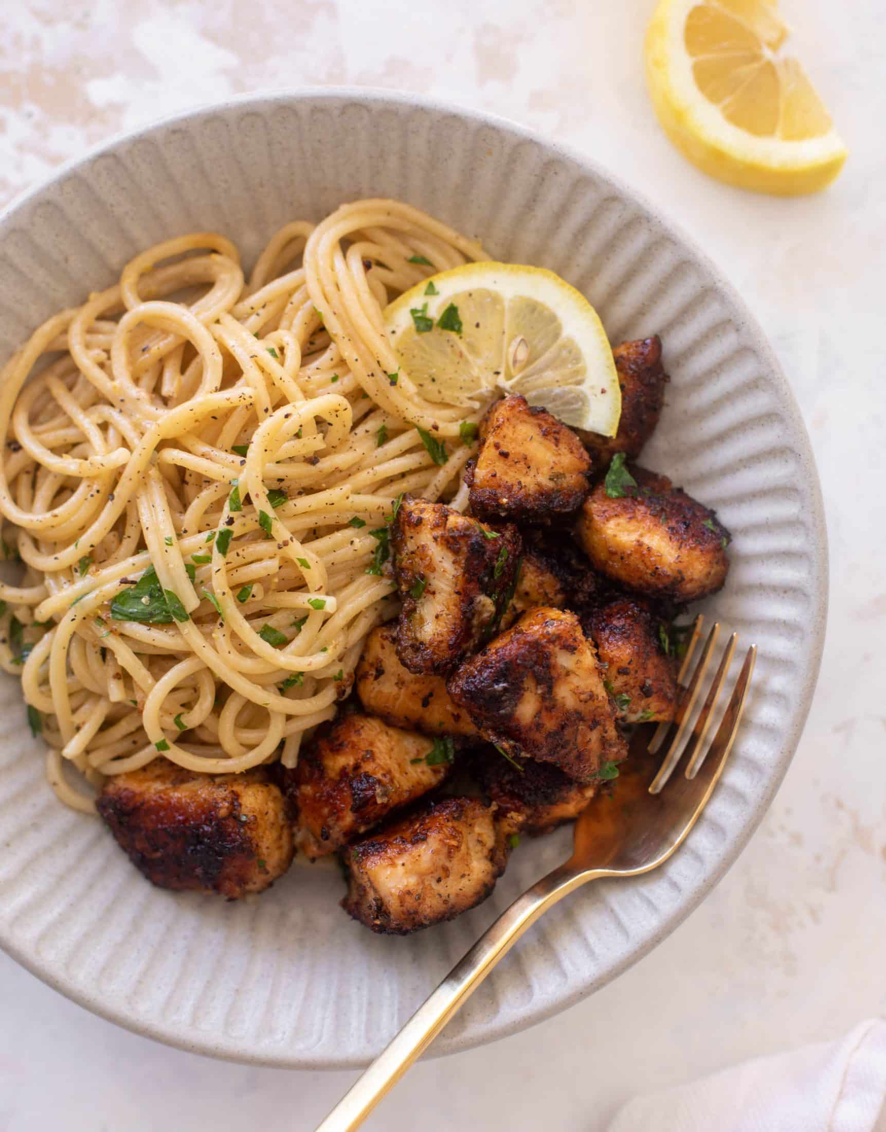 crispy lemon chicken bites and spaghetti