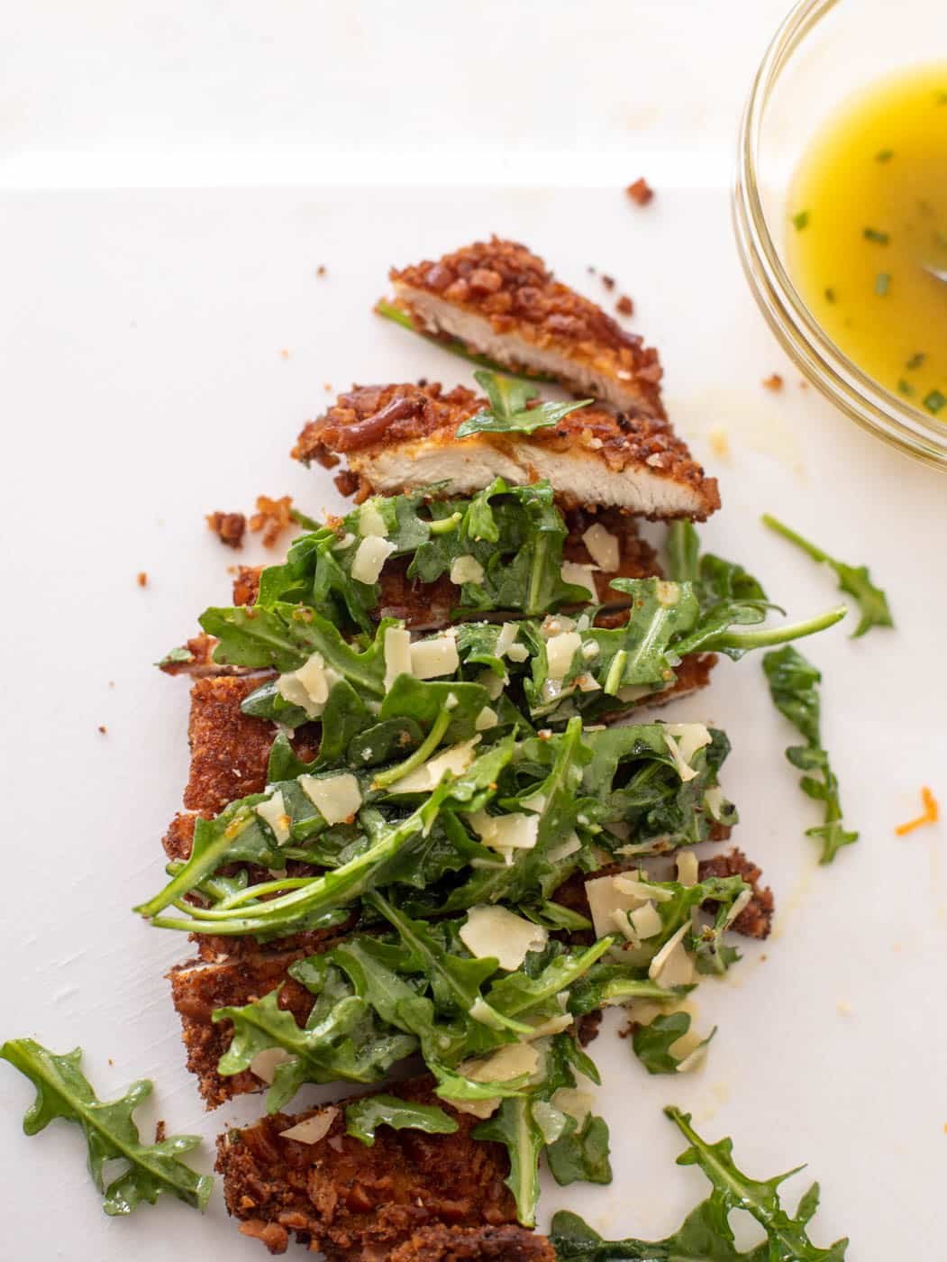 pretzel crusted chicken with honey mustard arugula
